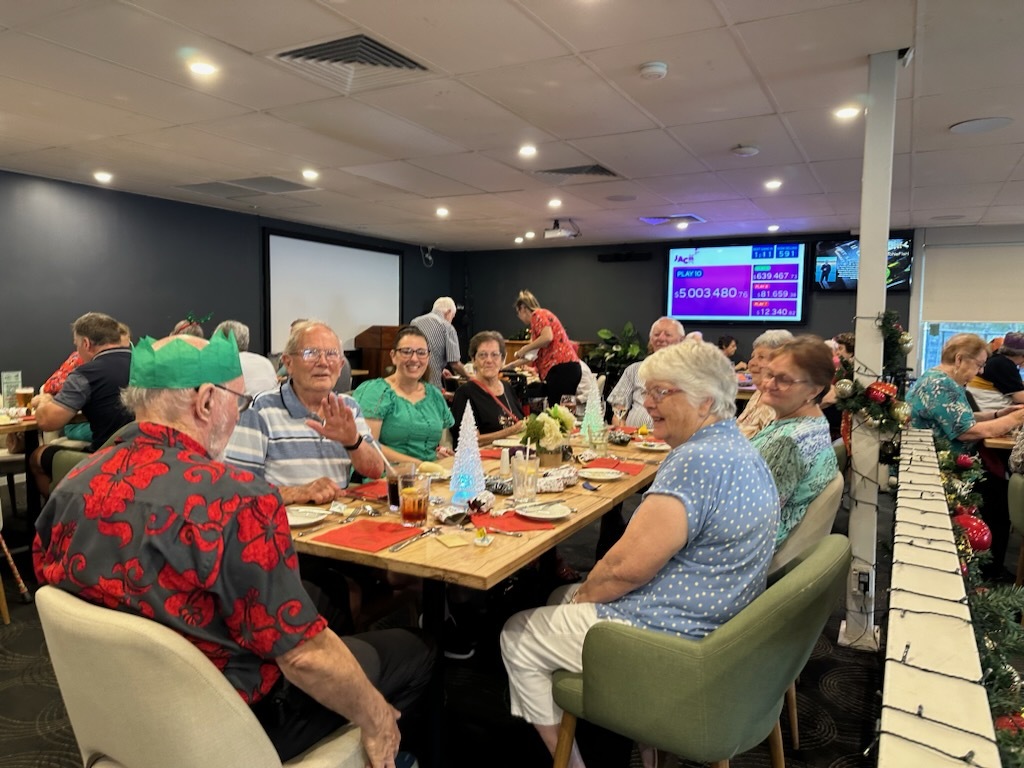 Our cheerful residents enjoy a sumptous lunch